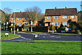 Houses overlooking mini roundabout in Underwood Road in SO50 8PT