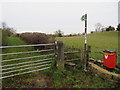 Public footpath, stile, gatepost and a bench mark at Bwlch y Ddeufryn, Gwernaffield in Gwernaffield with Pantymwyn Community