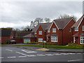 Modern houses at the junction of Stemson Avenue and Harrington Lane in EX4 8QN
