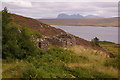 Ruined cottages above Ardnagoine, with Suilven in the background in IV26 2YN