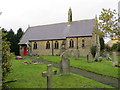The Church of St Thomas and part of its burial grounds at Scotton in HG5 9HX