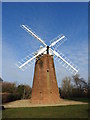 Dereham Windmill in a mottled blue sky in NR20 3TJ
