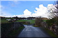 A small country lane crosses a stream in Henryd