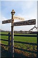Direction Sign - Signpost by the A361, east of Doulting in BA4 4QF