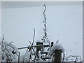 Wiggly fence in the snow at Bottom House Farm Lane in HP8 4NT
