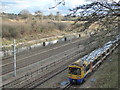 A London Overground train seen from Little Oxhey Lane in WD19 5ES