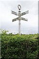 Direction Sign - Signpost on the crossroads of Rake Lane, Plough Lane and Brown Heath Road in Christleton