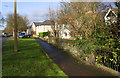 Houses and pavement beside Chesterfield Road in S18 1XJ