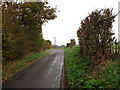 Looking northeast on unnamed road in NR20 4BA
