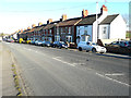 Houses along Main Road in NN8 3AT
