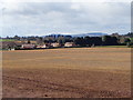 Looking across the fields to new houses Harvington in DY10 4LR