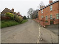 Mill Lane at its junction with Beck Lane in Melton le Marsh in PE23 5SY
