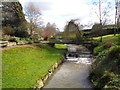 Footbridge and weir on the Belne Brook at Hillpool in DY10 4NL