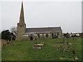 The Church of St Peter and part of its burial ground at South Somercotes in South Somercotes