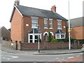 Semi-detached houses at junction of Locks Road with the A27 in SO31 1BU