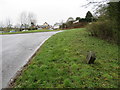 Pen-y-Stryt crossroads and a damaged milestone in LL11 3AG