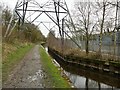 Canal under an electricity pylon in SK15 3HW