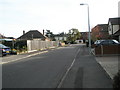 Looking towards the junction of Hollybrook Gardens and Locks Road in SO31 6PJ