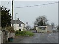 Bus shelter and notices at the heart of Stibb Cross in EX38 8LH