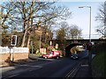 Road junction and railway bridge at Brotton in TS12 2TA