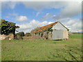 Derelict farm buildings in IP25 7QJ
