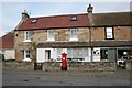 Shops and pillarbox, Kingsbarns in KY16 8TQ
