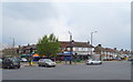 Shops and houses on Eastcote Lane, Harrow in HA2 0PX
