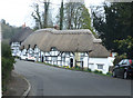 Cottages and War memorial, Wherwell in SP11 7JG
