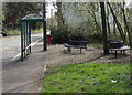Metal benches near a bus stop and shelter, Caerphilly Road, Abertridwr in Aber Valley Community