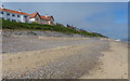 Houses along the shoreline at Thorpeness in IP16 4QU