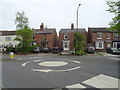 Mini roundabout and houses on Aughton Street (B5319), Ormskirk in Ormskirk