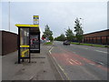 Bus stop and shelter on Long Lane (B5197), Fazakerley in L9 7LG