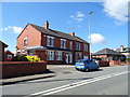 Houses on Wrexham Road (A525), Marchwiel in LL13 0PH