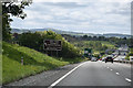 Tourist signs approaching junc 27A in LL17 0DT