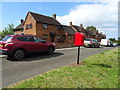 Elizabeth II postbox on Holywell Lane, Clutton in CH3 9XR