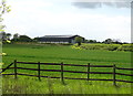 Crop field and barn near Bulphan in Bulphan