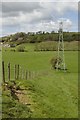 Fence and electricity pylon near Pen-y-stryt in LL11 3AB