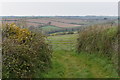Field entrance and view of the valley of the Ruan River in TR2 5LD