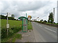 Bus stop and shelter on Gresford Road (B5373) in LL12 9PF