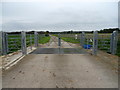 Gated track to Whitehouse Farm in CH64 5SQ