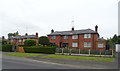 Houses on Burton Road, Little Neston in CH64 0UR