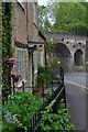 House front and railway bridge at Legg Bridge in BA10 0BT