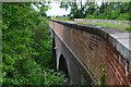 Bridge over former railway line in NN7 3HH