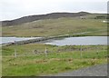 The A971 crosses the Loch of Brouster in Shetland West Ward