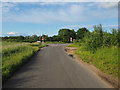 Minor road junction with A1075 in IP25 6RL