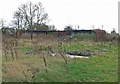 Rusted and derelict farm buildings in LE17 5JF