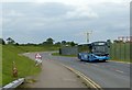 Skylink bus and old milestone, East Midlands Airport in DE74 2WL