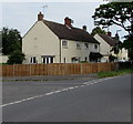 Houses and wooden fencing, Shurdington in GL51 4XW