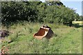 Excavator stored on the ground, Woodside in AL9 6DU