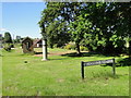 Bus shelter, village sign and roadsign at Swafield in NR28 0RJ